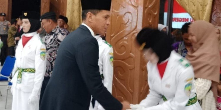 Hadiri Pengukuhan Paskibra KTT, Jamhari :Tetap Jaga Kesehatan