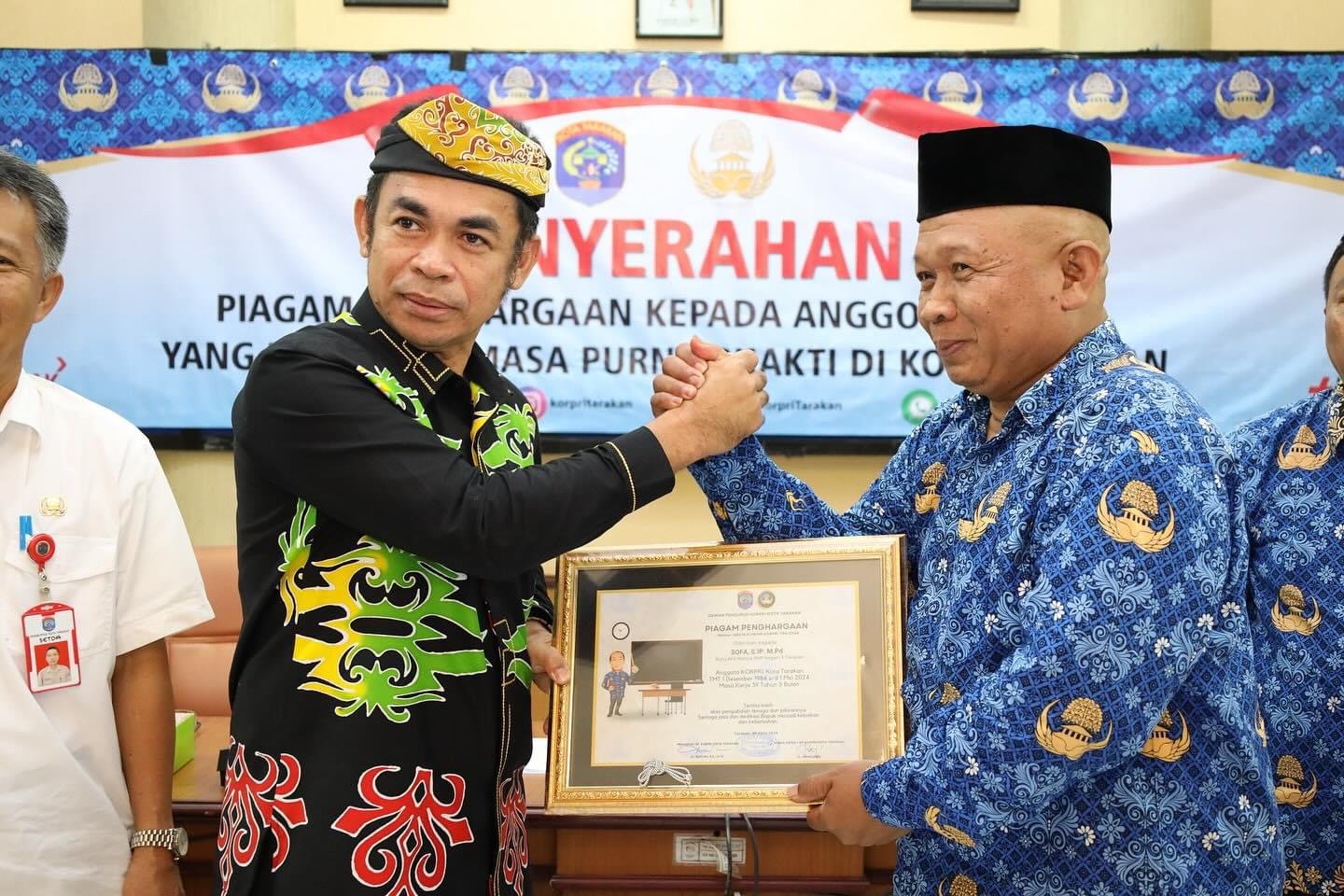 Penyerahan Piagam Penghargaan Purnatugas Bhakti